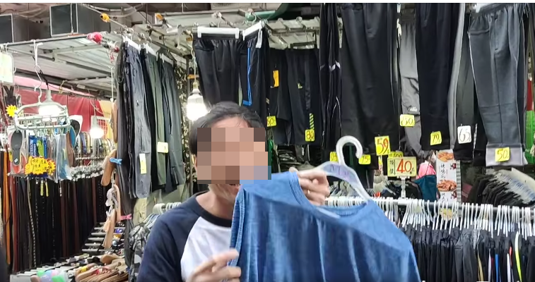 該男子不滿顧客要檢查衣服。(FB「長沙灣街坊」)