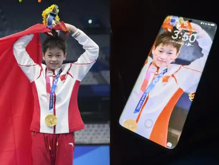 全爸的手機桌布是全紅嬋東京奧運奪金的照片。(《九派新聞》)
