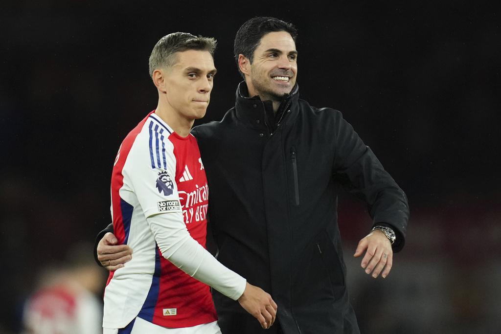 阿仙奴贏波後,與榜首利物浦的距離減至7分。(美聯社)