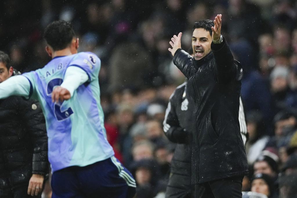 阿仙奴失分後,以15戰29分排第3,6分落後少踢一場的榜首球隊利物浦。(美聯社)