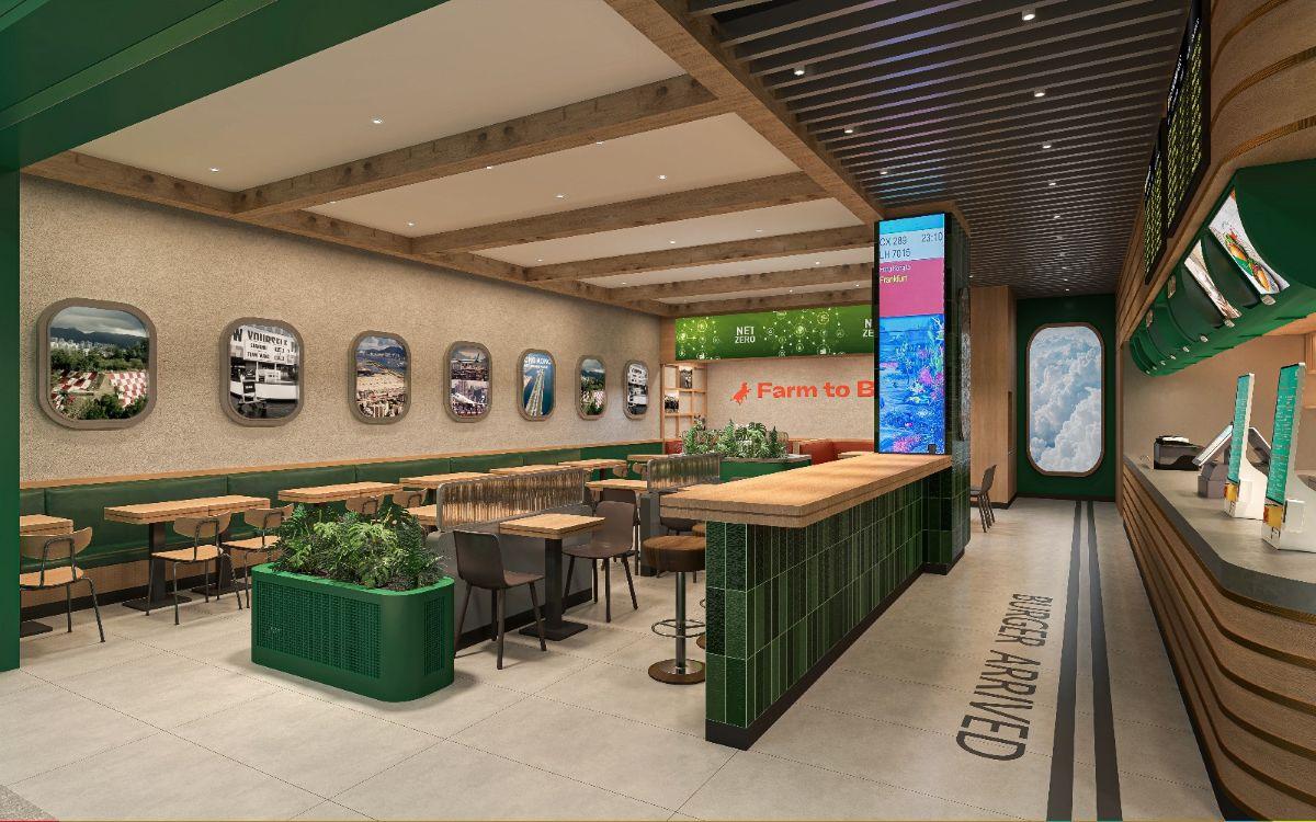 仿機艙窗戶展示香港舊啟德機場照片。