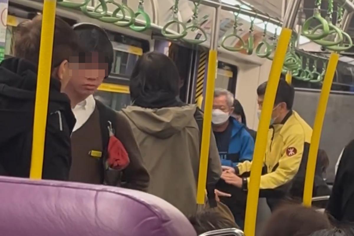 港鐵有乘客就車廂飲食斥責其他人,同時有男學生正從容地聽音樂擺動身體,相映成趣。(Threads影片截圖)