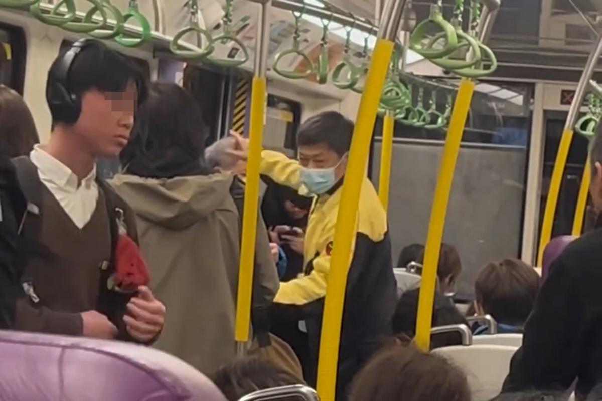 港鐵有乘客就車廂飲食斥責其他人,同時有男學生正從容地聽音樂擺動身體,相映成趣。(Threads影片截圖)