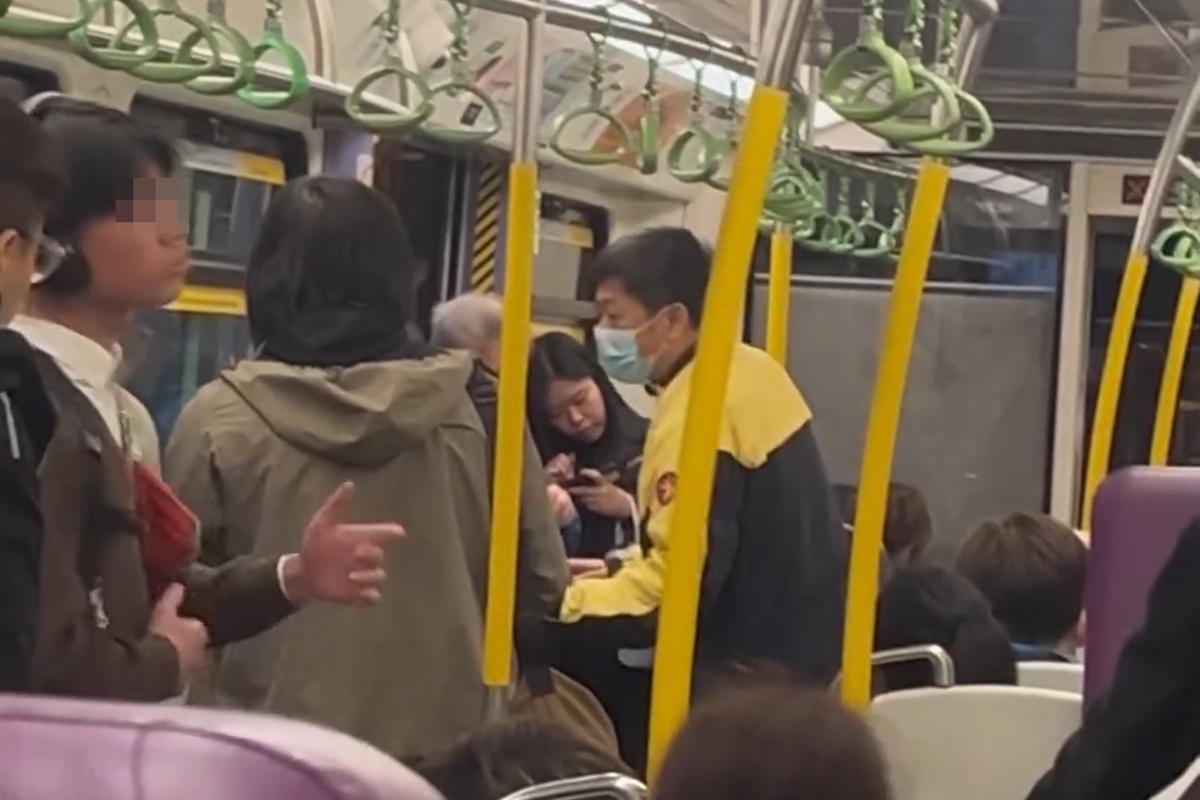 港鐵有乘客就車廂飲食斥責其他人,同時有男學生正從容地聽音樂擺動身體,相映成趣。(Threads影片截圖)