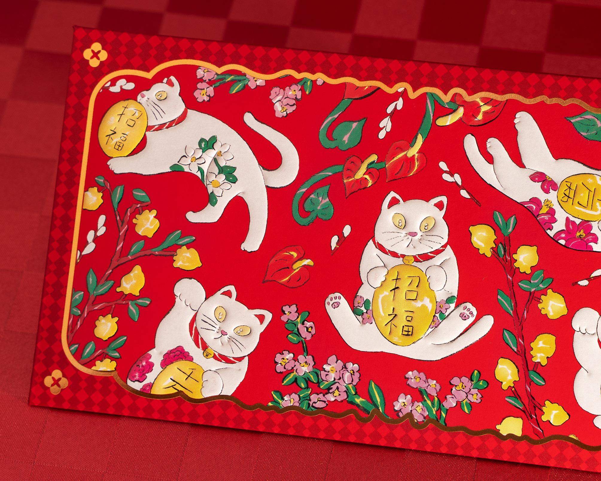 「幸運棋緣」利是封以馬、風車、繁花及招財貓等為主題。