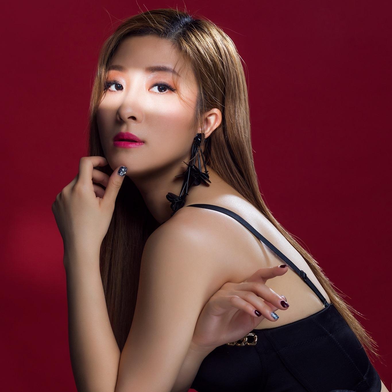 黎美言昔日照片。