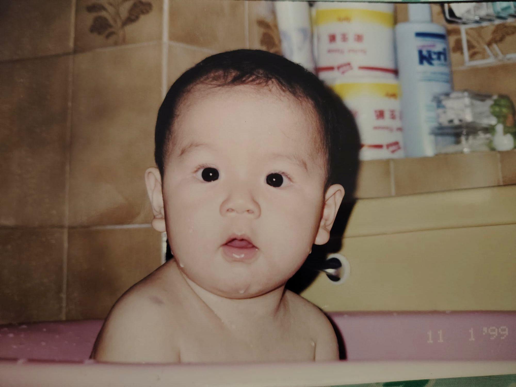 吳偉豪小時候。