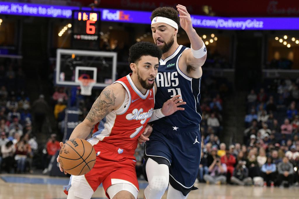 灰熊119:106贏獨行俠。(美聯社)