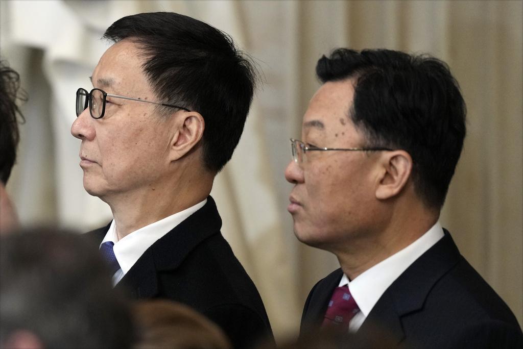 國家副主席韓正(左)、中國駐美大使謝鋒(右)出席特朗普就職禮。(美聯社)