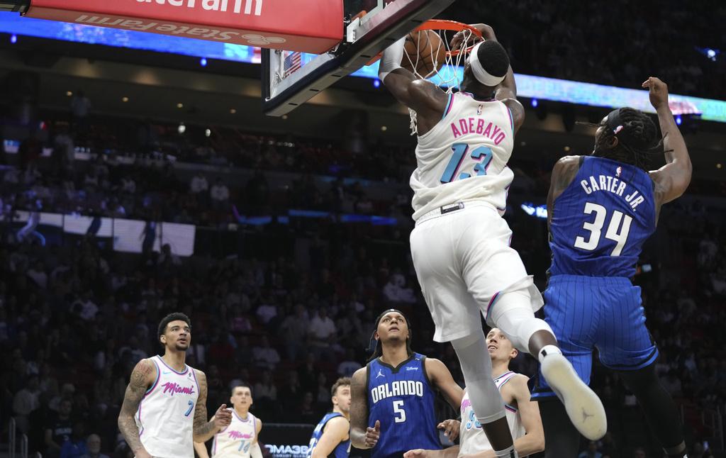 熱火加時125:119擊敗魔術。(美聯社)