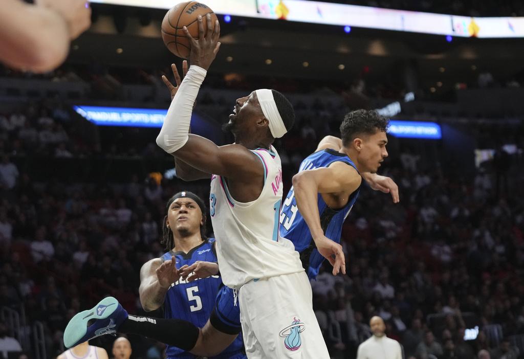 熱火加時125:119擊敗魔術。(美聯社)