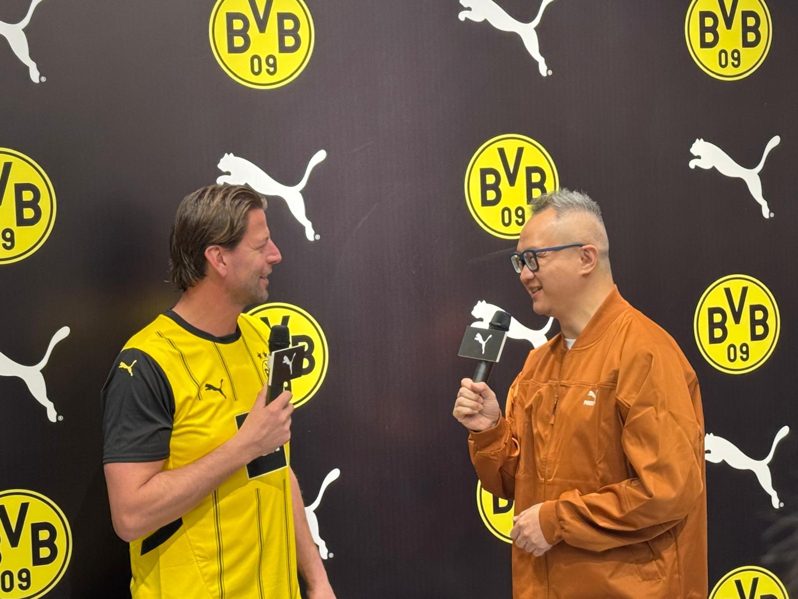 維丹費拿與足球評述員劉舜文交流時,盛讚啟德體育園設施達到世界級水平,能媲美歐洲各大著名球場,包括多蒙特主場西法倫球場。