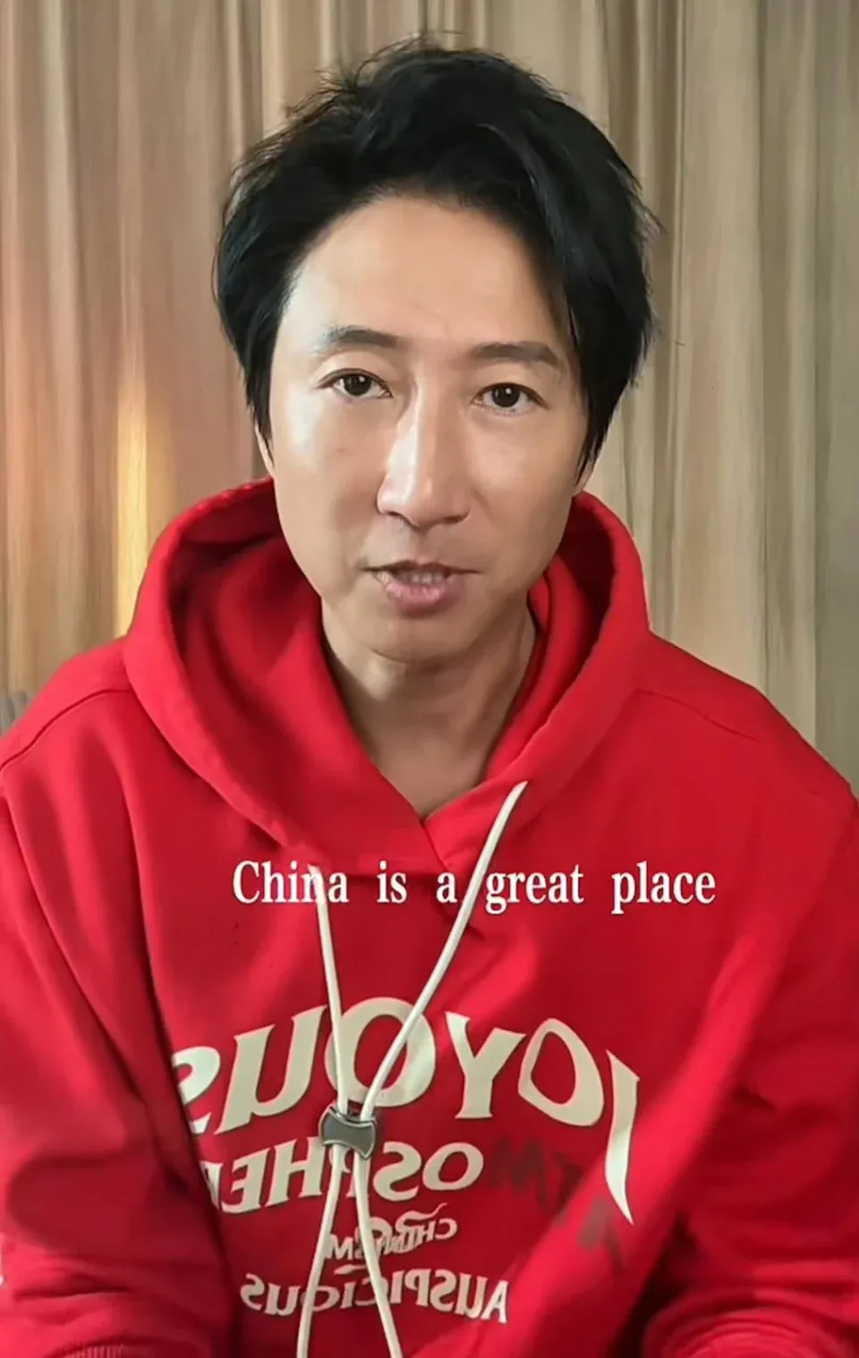 洪天明拍片宣揚中國