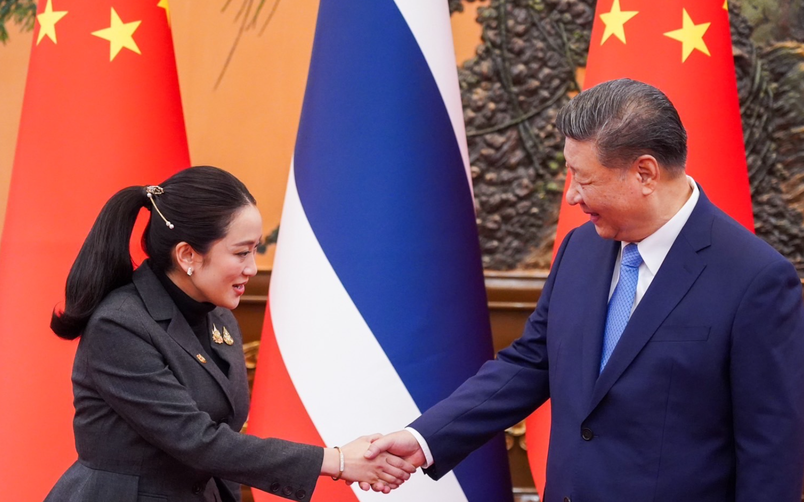 國家主席習近平在北京會見訪華的泰國總理佩通坦。