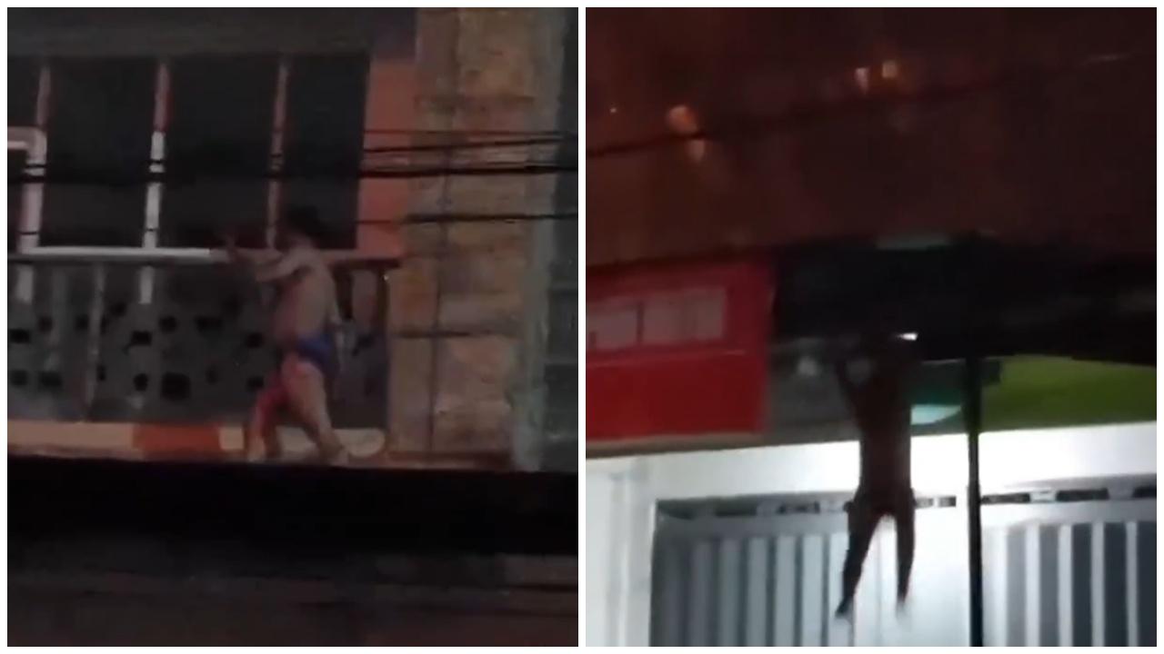 男子於建築物狹窄的平台繼續步行,直至疑失足墮下地面。(X)