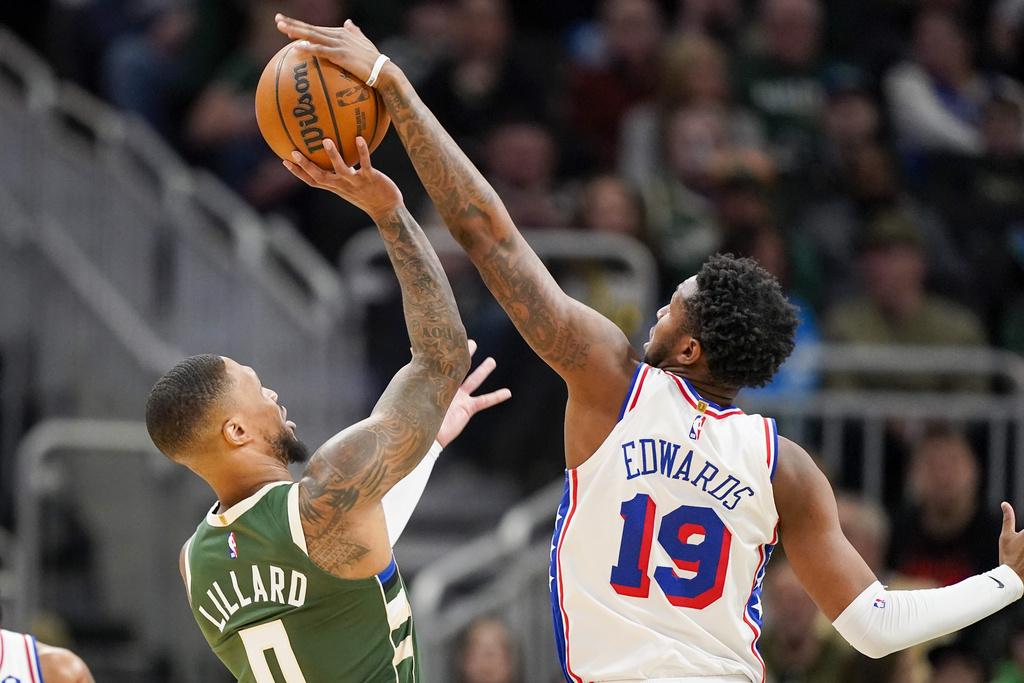 公鹿135:127擊敗76人。(美聯社)