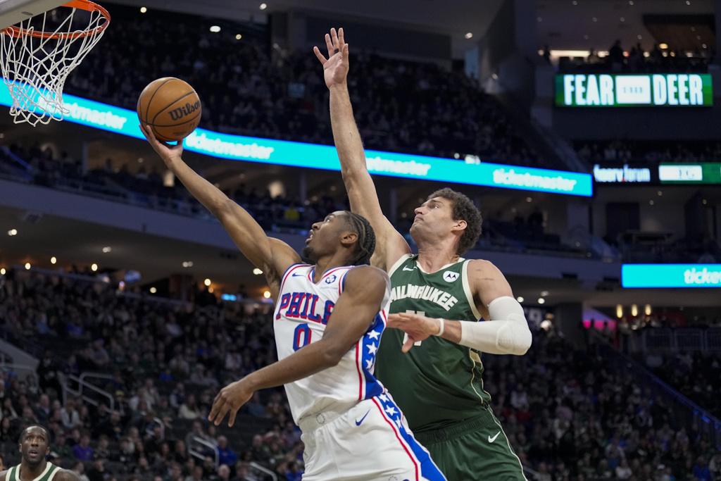 公鹿135:127擊敗76人。(美聯社)