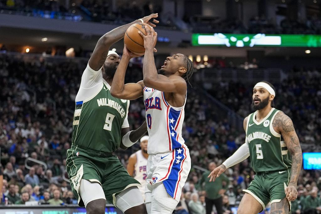 公鹿135:127擊敗76人。(美聯社)