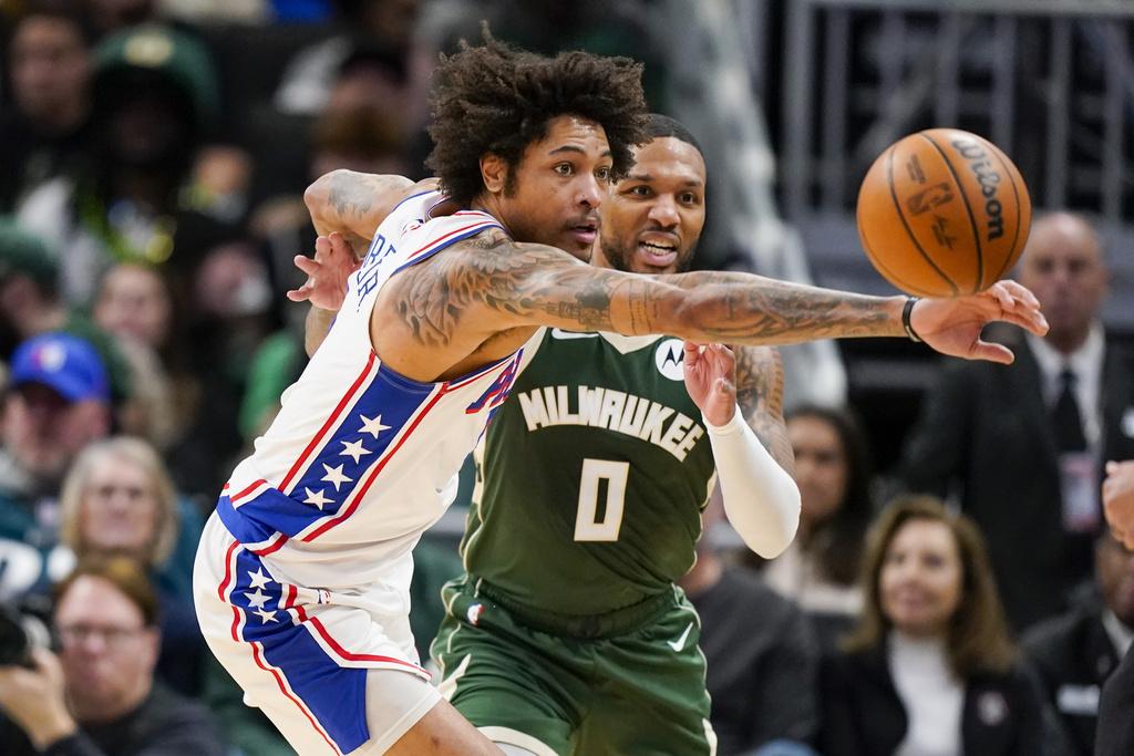 公鹿135:127擊敗76人。(美聯社)