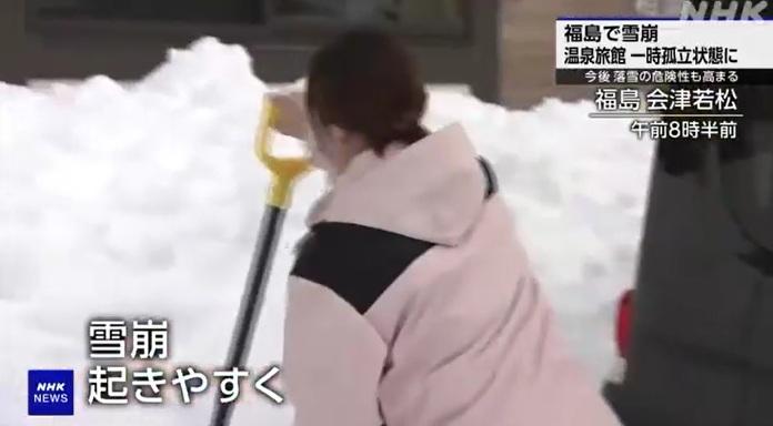 福島縣居民忙於除雪。(互聯網)