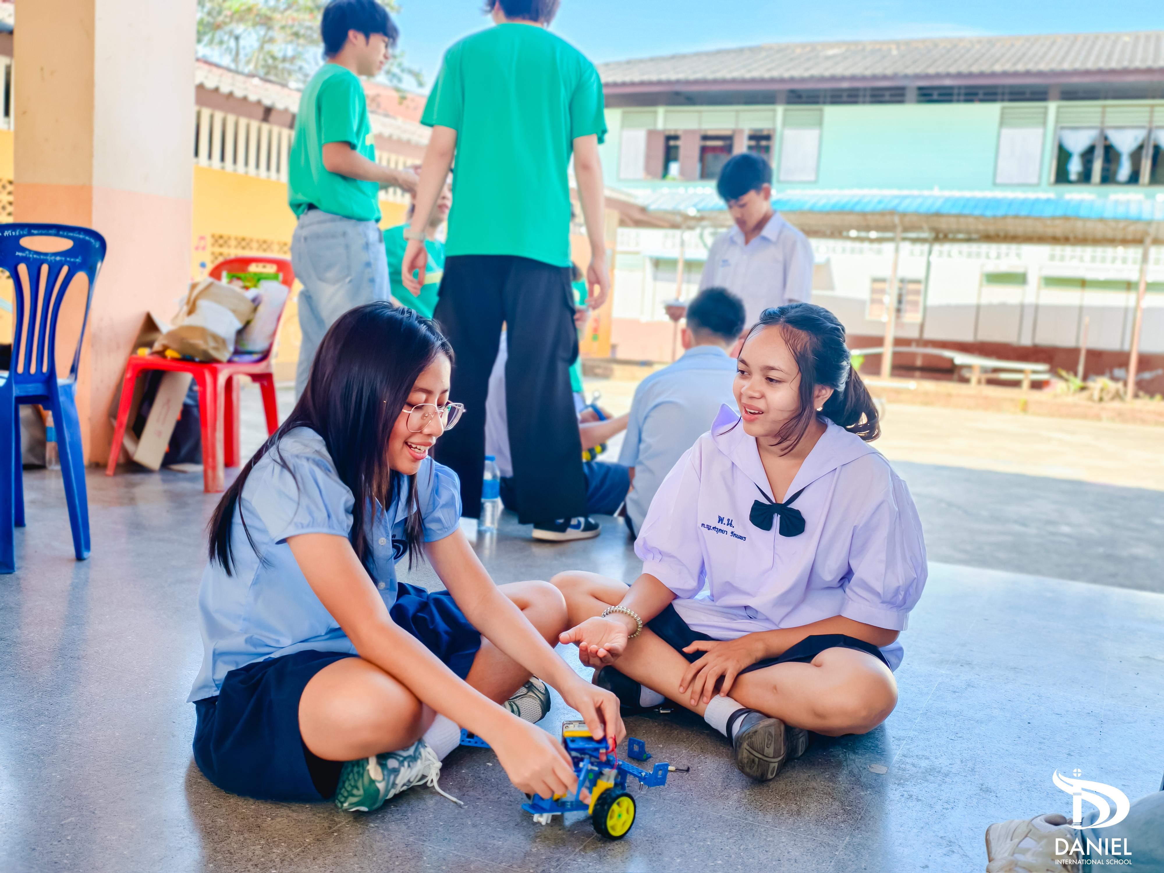 但以理國際學校學生學習關懷平民學童。