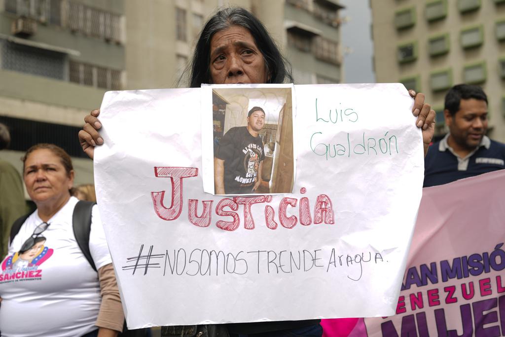 委內瑞拉民眾周二在首都加拉加斯遊行示威,抗議美國把委國黑幫成員送到薩爾瓦多監禁。(美聯社)