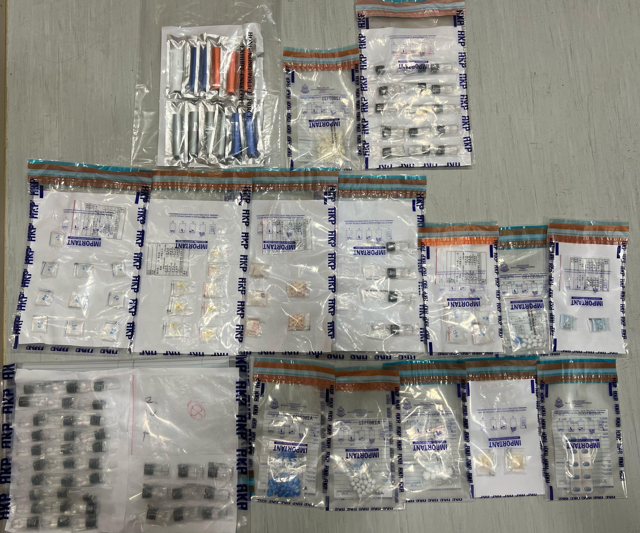 警秀茂坪兩住宅單位拘38人,檢冰毒、太空油等7萬元毒品。(警方圖片)