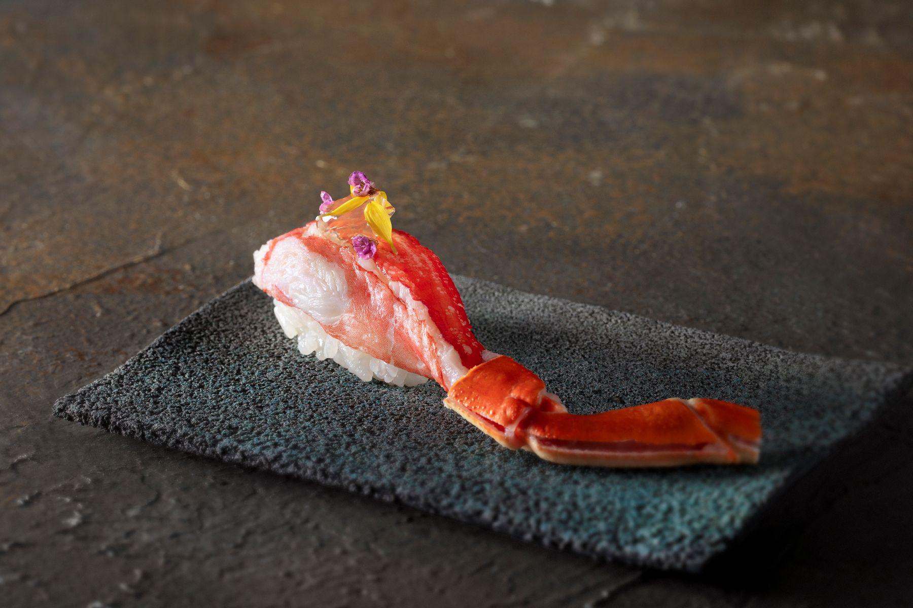 松葉蟹腳配柚子啫喱壽司($38/件)