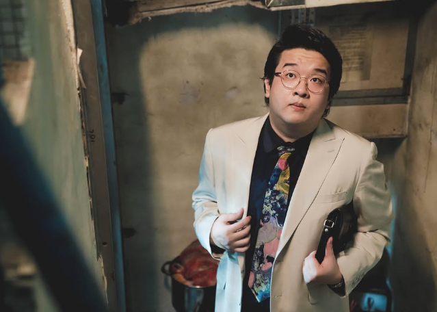 肥腸在《三命》,演駱澤信一起成長的好友阿勤。