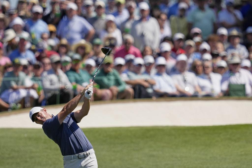 麥萊爾(Rory McIlroy)完成高爾夫大滿貫。(美聯社)