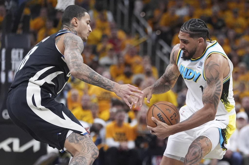 溜馬加時119:118擊敗公鹿。(美聯社)