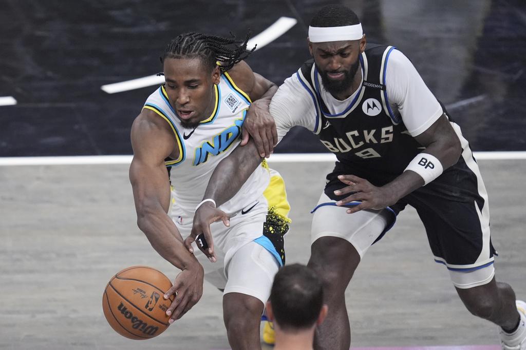 溜馬加時119:118擊敗公鹿。(美聯社)