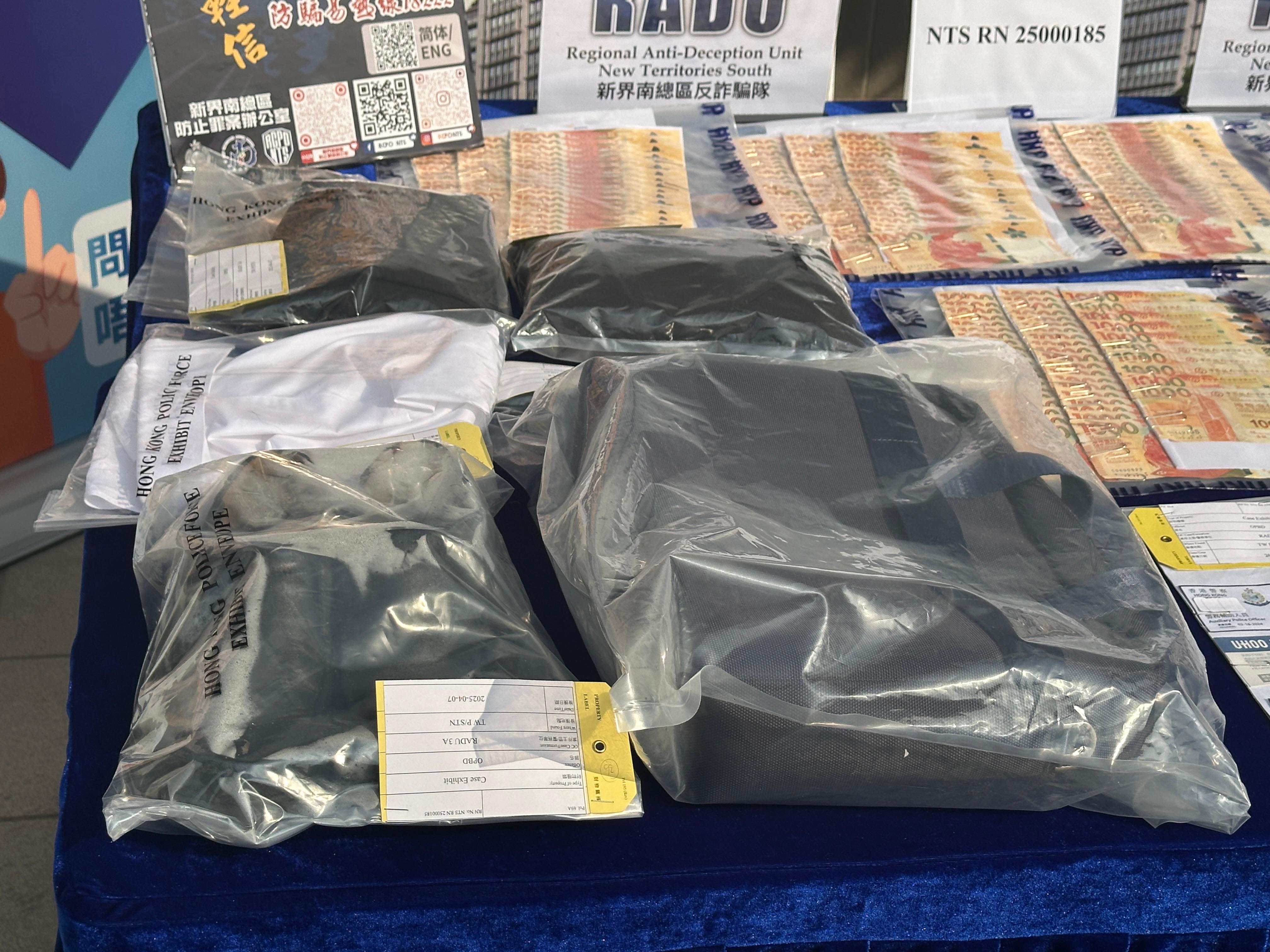 警方檢獲偽造的委任證和公函,以及受害人準備交出的31萬元。