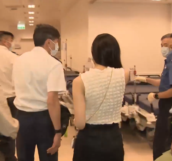 女事主嘴及手受傷送院治理(有線新聞畫面)