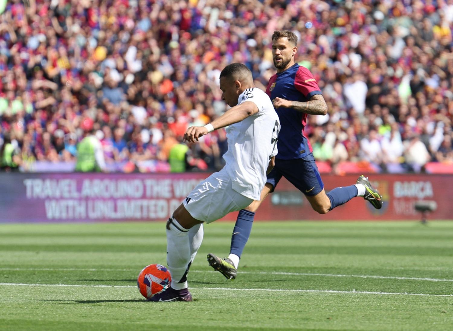 麥巴比上半場早段為皇家馬德里射成2:0。(路透社)