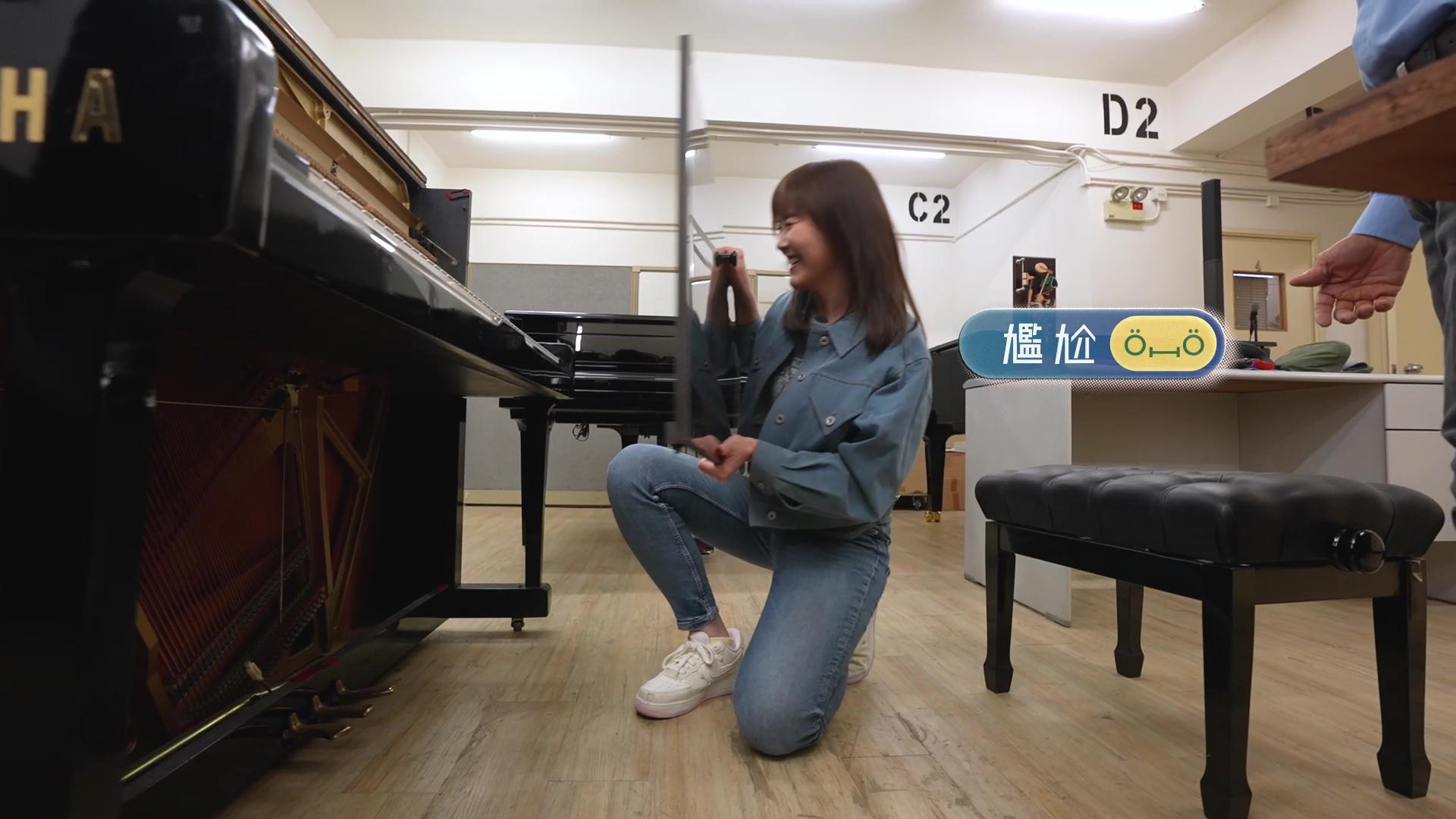 佢一度重到企唔到起身。