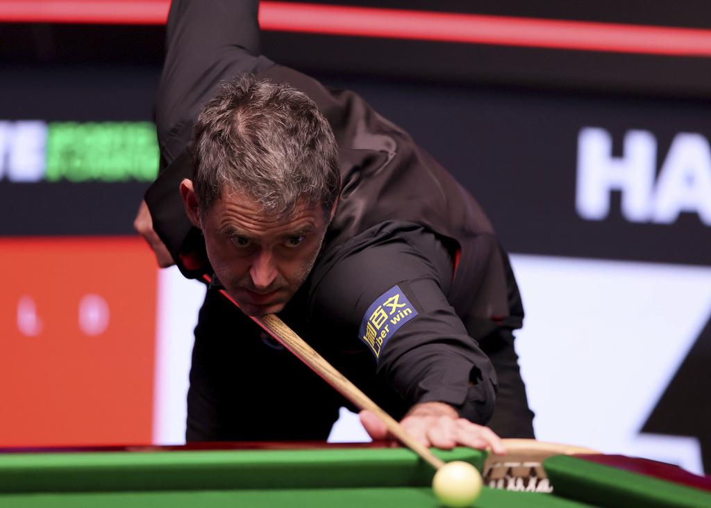 奧蘇利雲在世錦賽四強對上中國的趙心童。(美聯社)