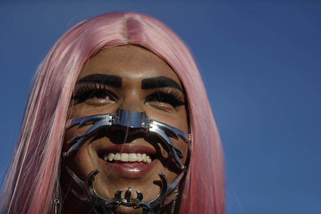 有粉絲以偶像造型吸睛。(美聯社)