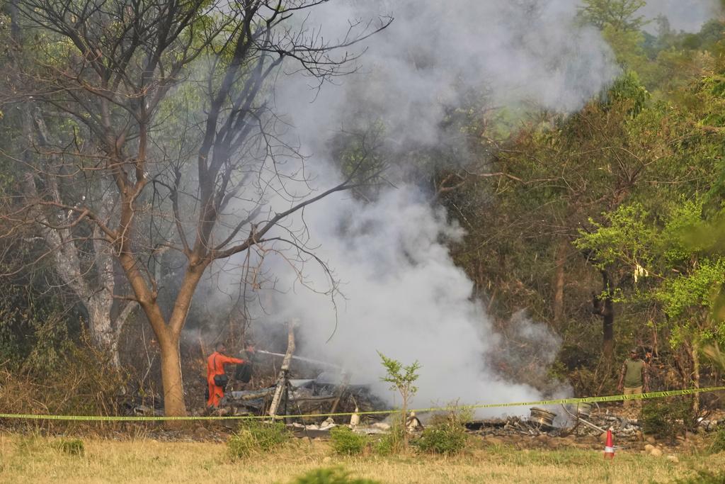 印控查謨地區有疑似軍機殘骸冒煙。(美聯社)