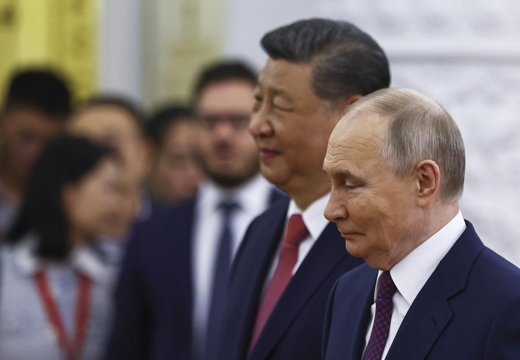 習近平周四在克里姆林宮與總統普京及俄官員會談。(美聯社)