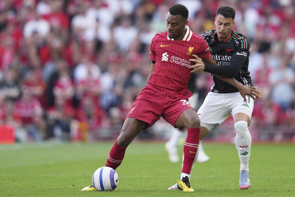 利物浦領先兩球下被阿仙奴追平。(美聯社)