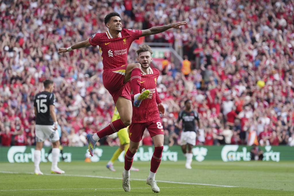 利物浦上半場2分鐘內連入兩球。(美聯社)