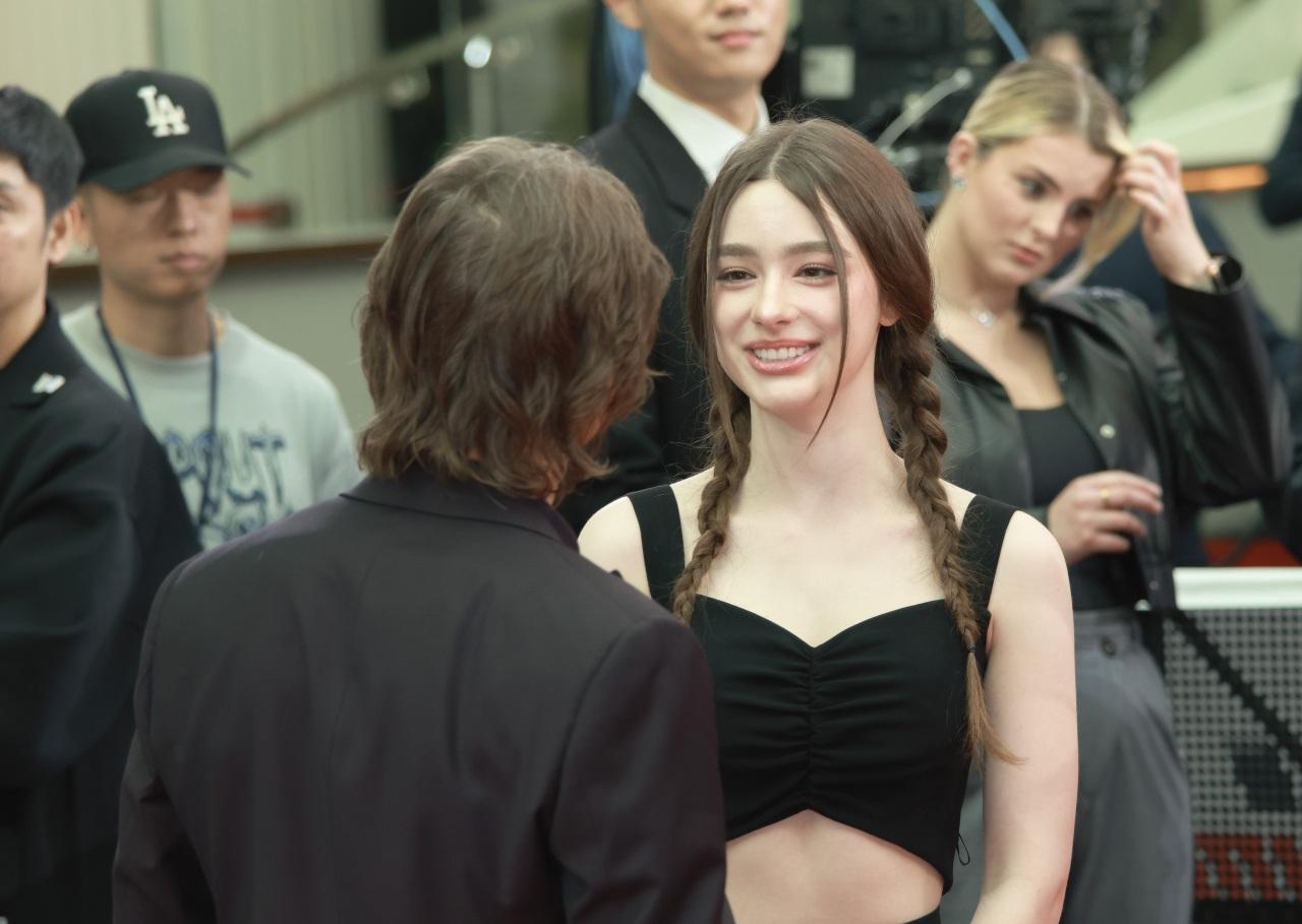 Dasha美麗的笑容,讓活動增添了活力。(網上圖片)