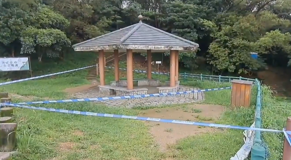 一名男子報稱在飛鵝山遇劫受傷,警方昨圍封現場調查(有線新聞畫面)