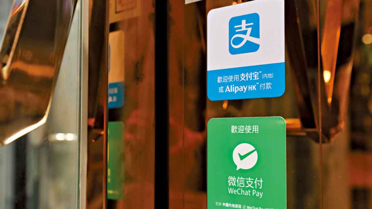 港人留港消費主要以信用卡結帳 北上消費則通常使用AlipayHK及微信支付等內地平台