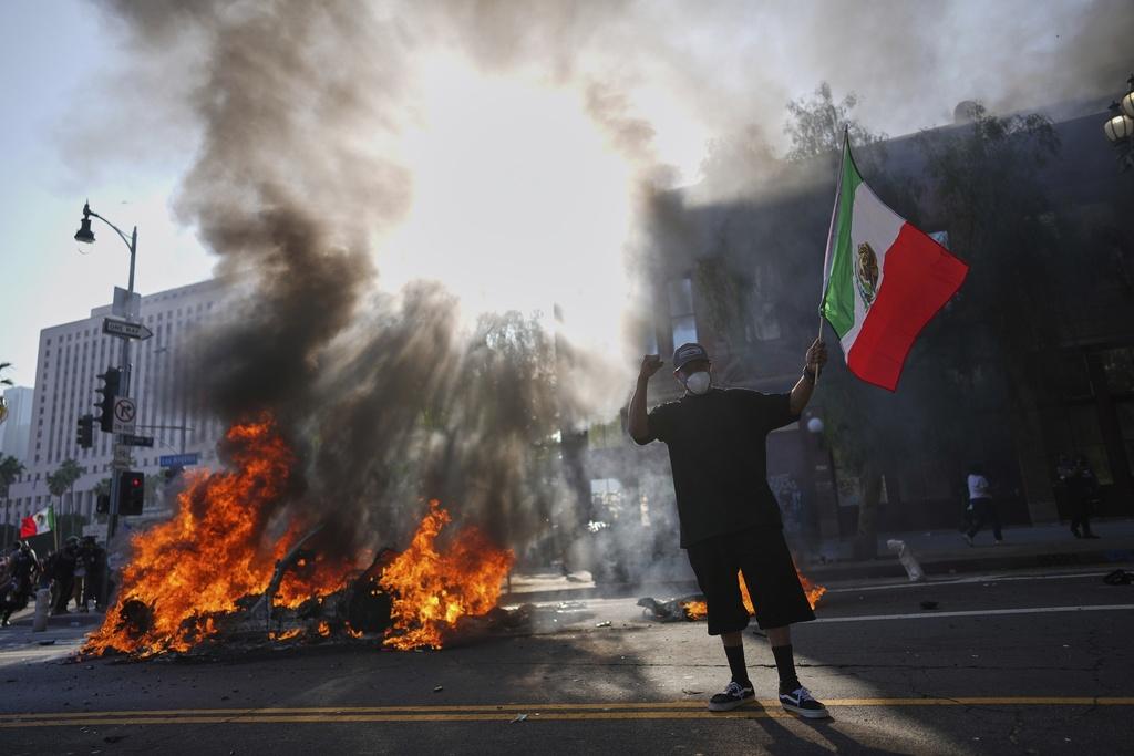 美國洛杉磯爆發警民衝突。(美聯社)