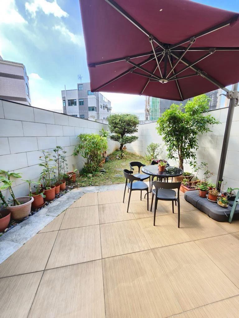 洋房附設花園。(代理提供)