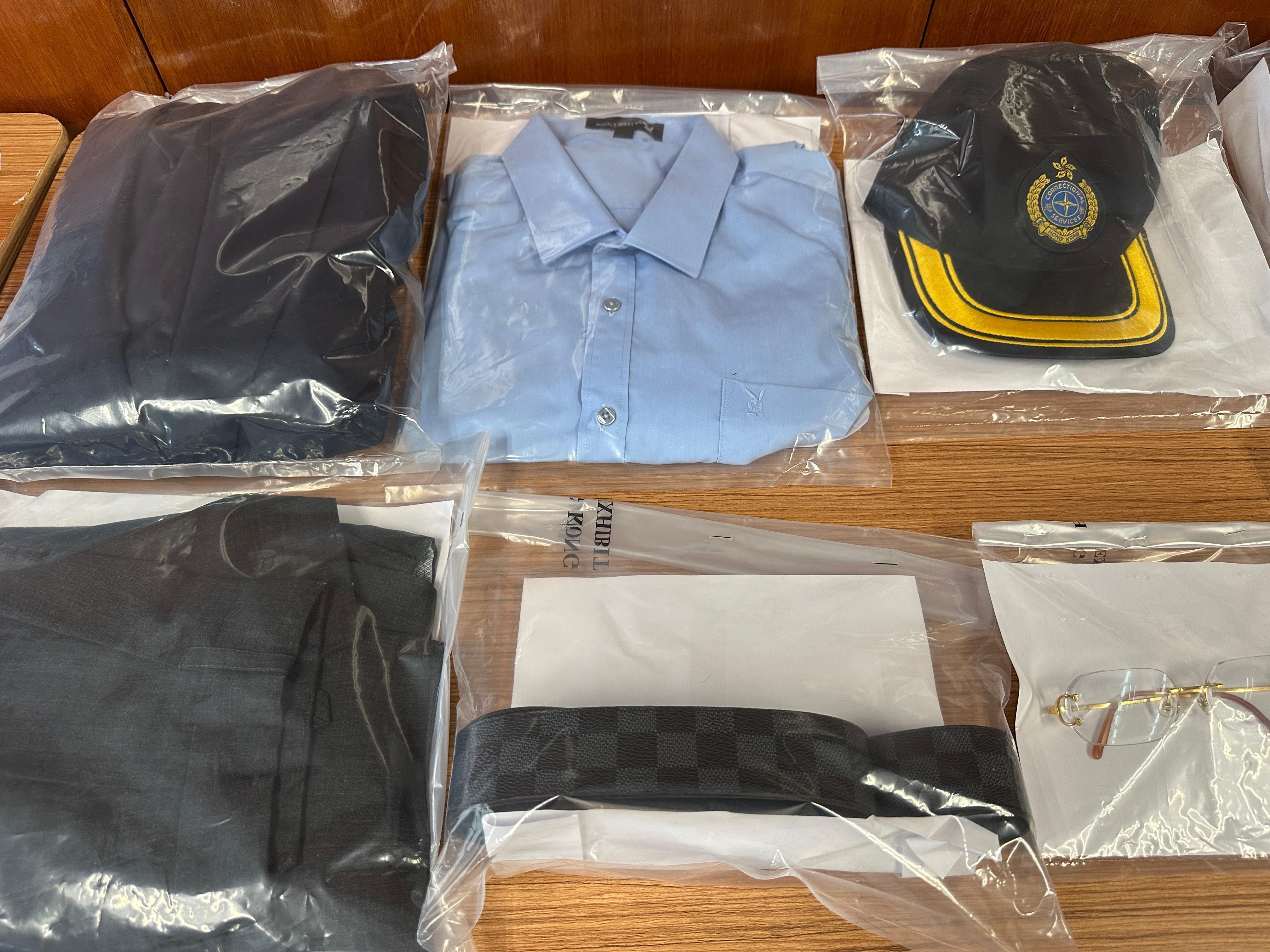 檢獲一頂香港紀律部隊的帽子及犯案時所穿著的衣服。