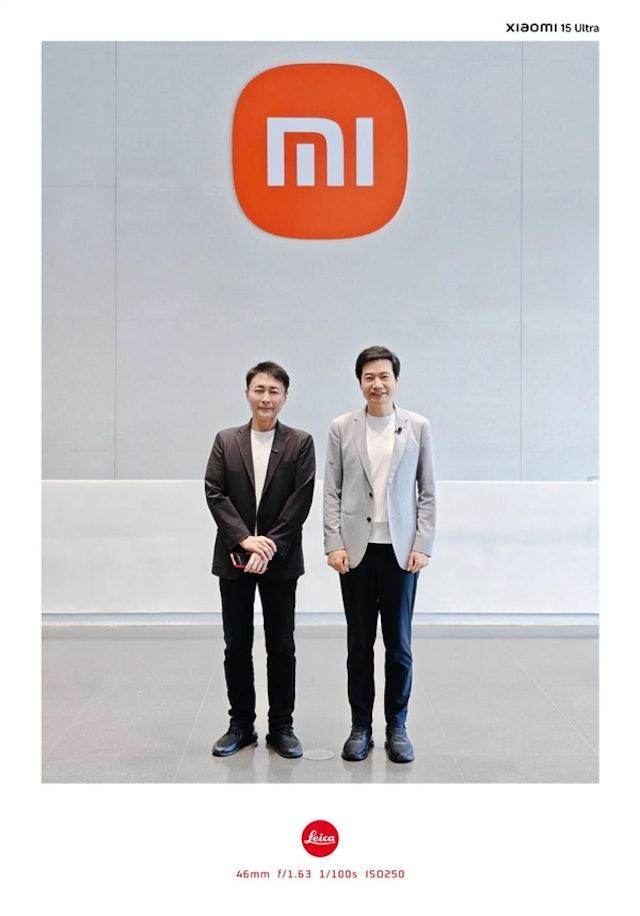 GT製作人山內一典與小米創辦人雷軍合照。(雷軍微博圖)