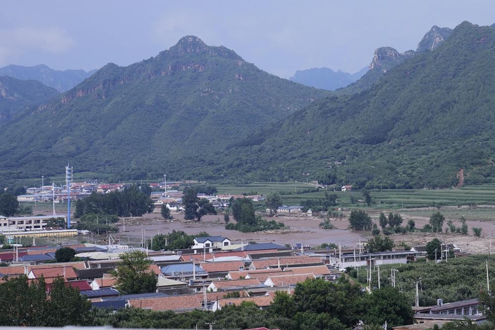 北京極端強降雨最少30死,中央啟動國家四級救災應急響應。(AP)